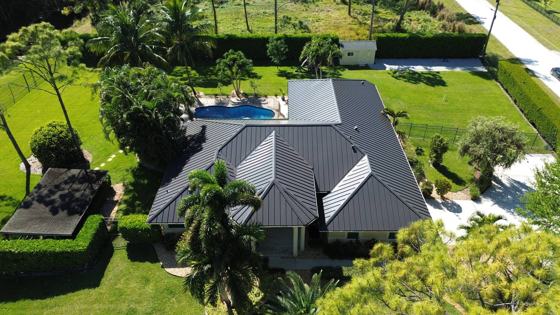 Roof in The Acreage put on by Ranger Roofing, drone photo from March 2025