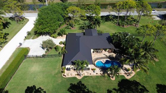 Roof in The Acreage put on by Ranger Roofing, drone photo from March 2025