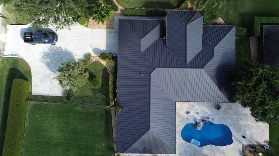 Roof in The Acreage put on by Ranger Roofing, drone photo from February 2025
